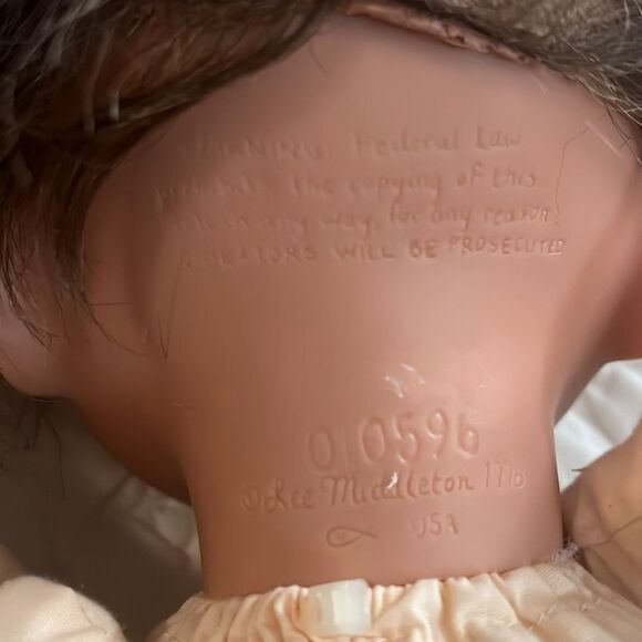 Realistic Baby Doll with Brown Hair - Picture 6 of 7